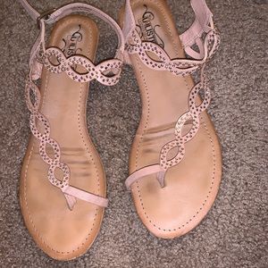 Light pink sandals with rhinestones.
